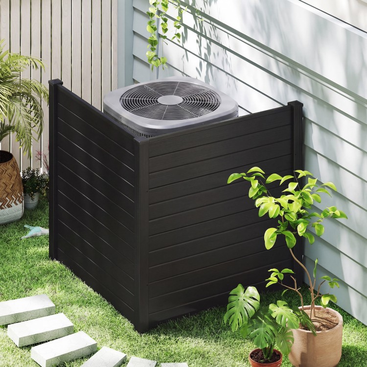 Freestanding black air conditioner fence with metal stakes, providing privacy for outdoor units and gardens.