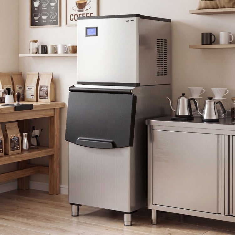 Freestanding commercial ice maker with stainless steel finish, producing 450 lbs of ice daily, ideal for busy.
