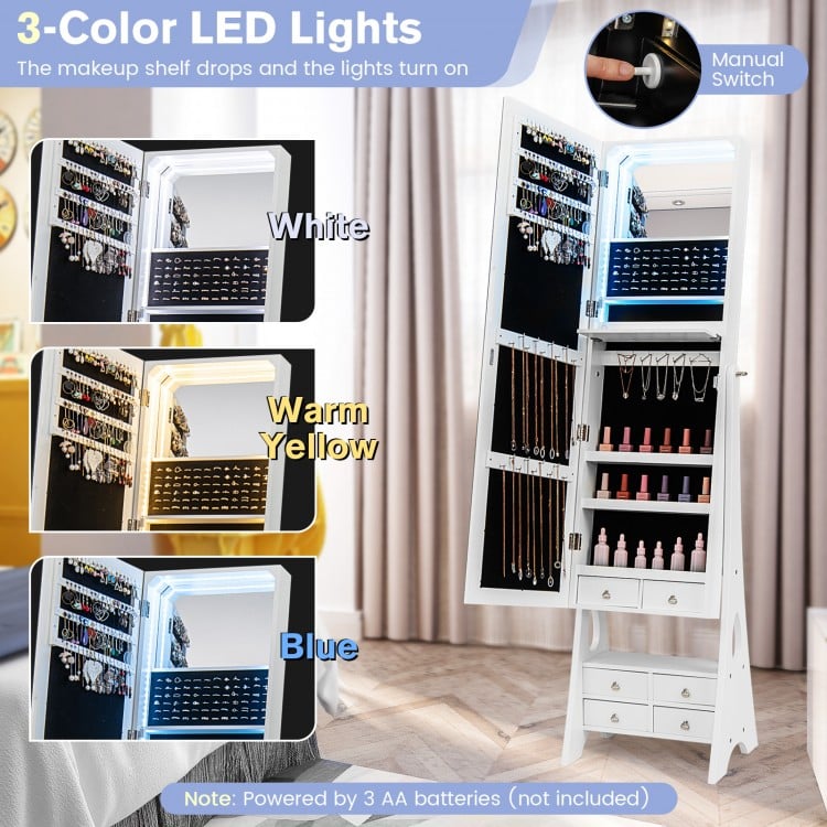 LED lights illuminate the inside of the freestanding white jewelry armoire, showcasing dual mirrors and organized.