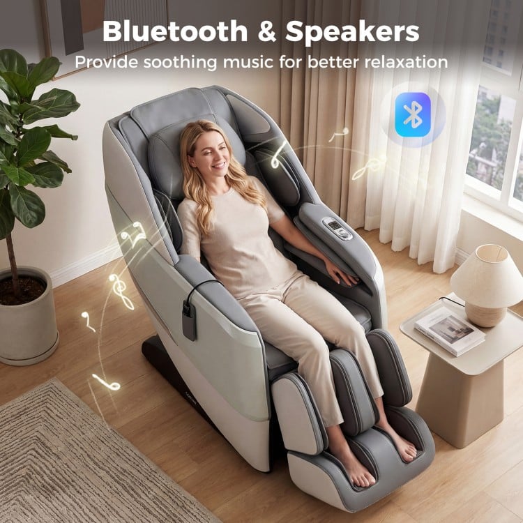 Full body zero gravity massage chair in white with Bluetooth speakers for soothing music and relaxation.