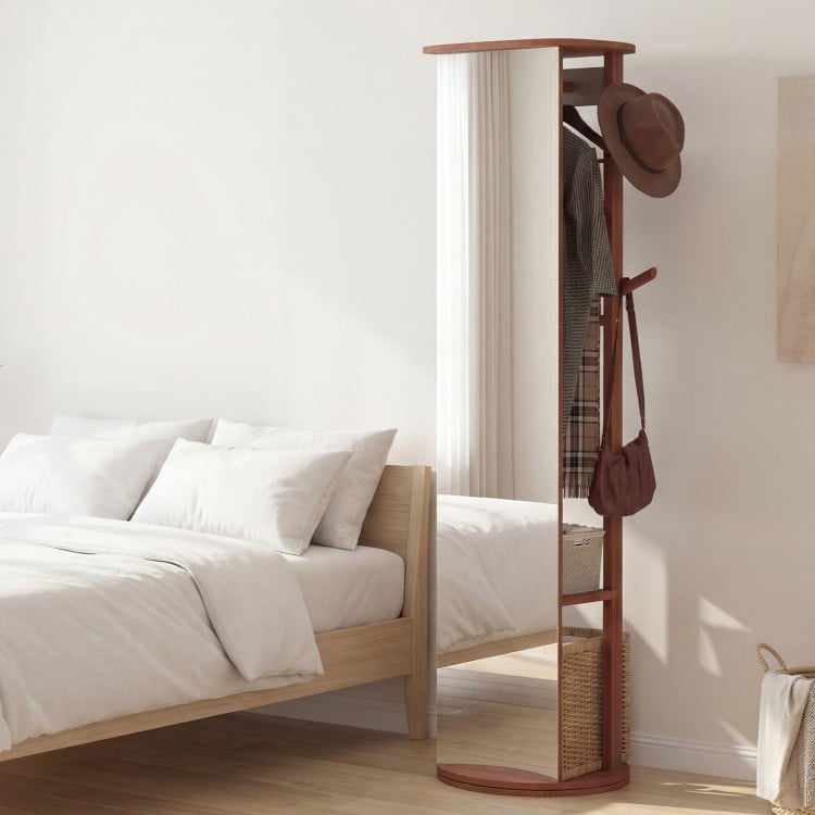 Full-length mirror coat rack in walnut with solid wood frame, featuring hooks and shelves for versatile storage.