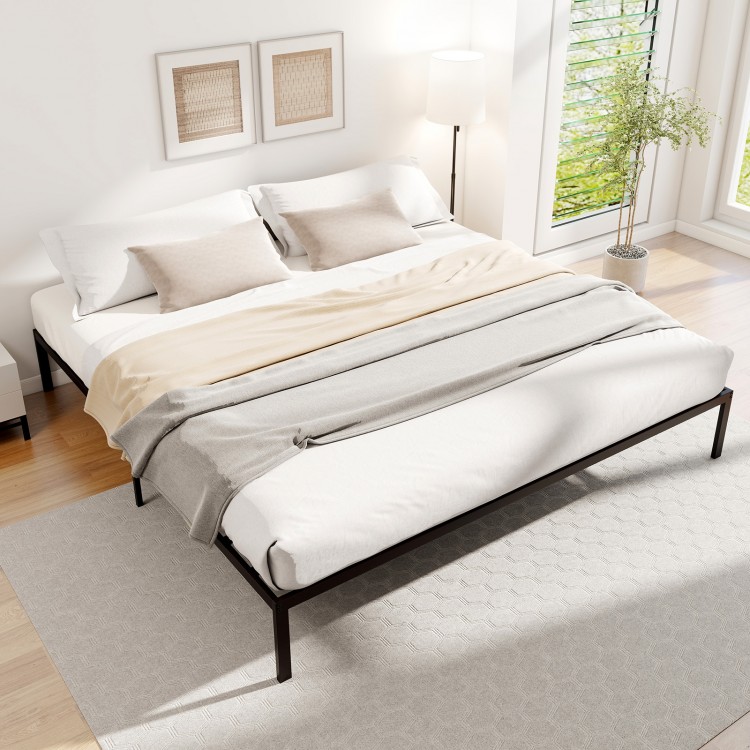 King size metal bed frame with heavy-duty slats, minimalist design, and ample under-bed storage for a stylish bedroom.