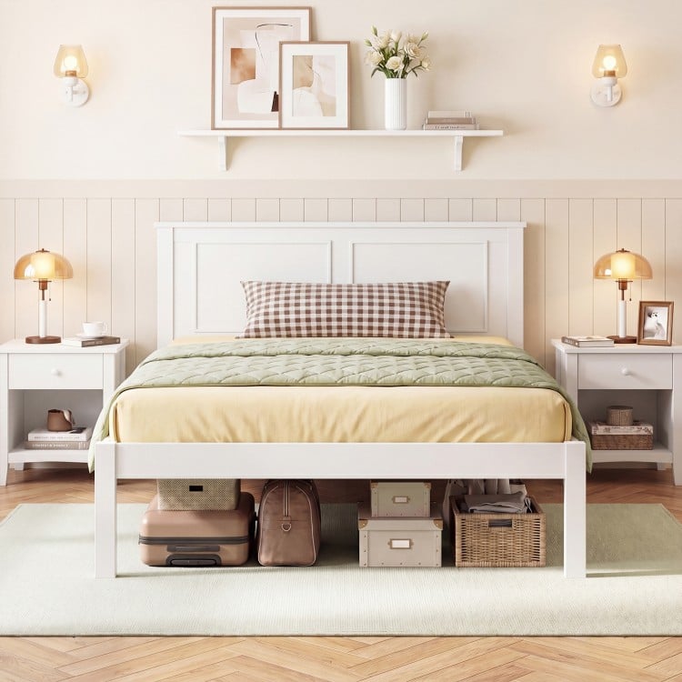 Twin size farmhouse wooden platform bed frame in white with storage underneath, featuring a simple rustic design.