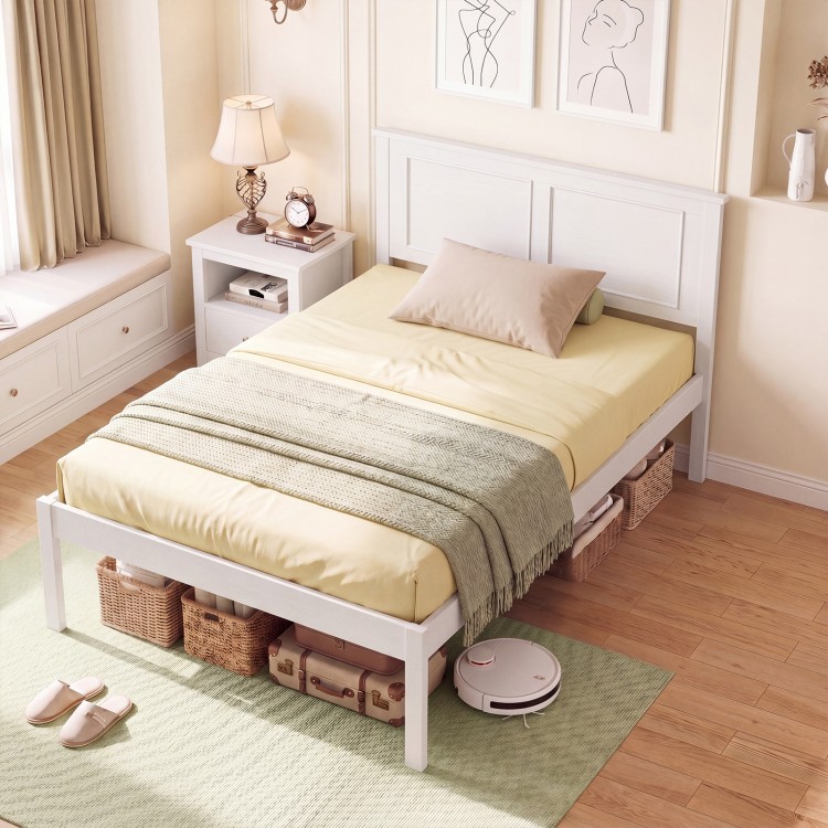Twin size farmhouse wooden platform bed frame in white with headboard, featuring under-bed storage and a cozy setup.