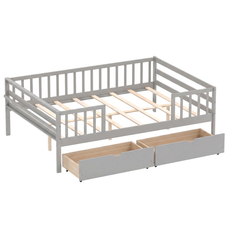 Gray full-size daybed with fence and two pull-out storage drawers, featuring a child-friendly design and sturdy support.