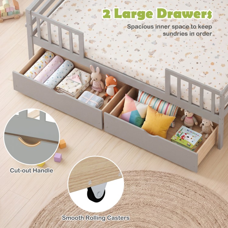 Full view of the gray full-size daybed with two large pull-out drawers for organized storage of toys and blankets.