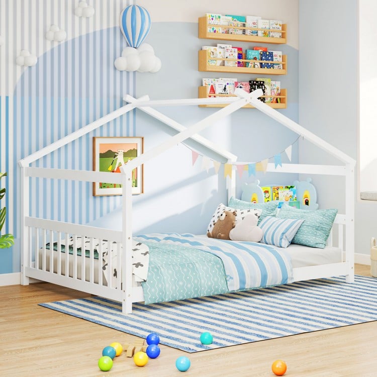 House-shaped full size Montessori floor bed in white with supportive headboard, ideal for children's creativity and.