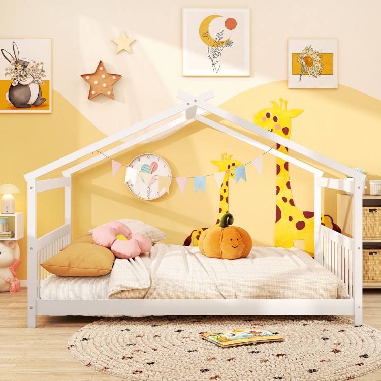 House-shaped full size Montessori floor bed in white with supportive headboard, perfect for children's creativity and.