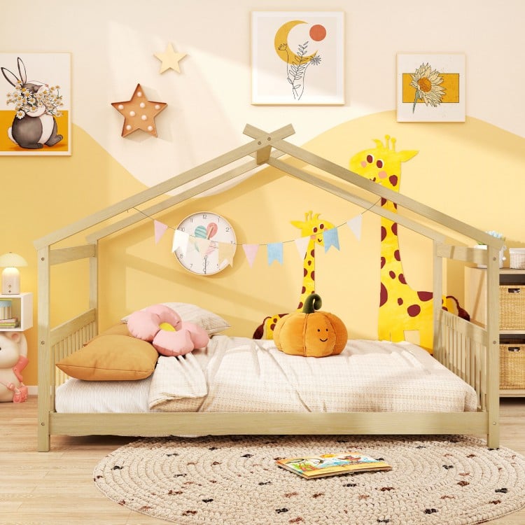 House-shaped Montessori floor bed in white with supportive headboard, ideal for children's creativity and playtime.