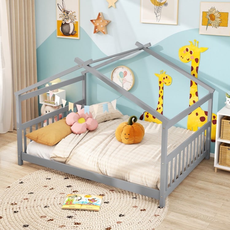 House-shaped Montessori floor bed in gray with supportive headboard, perfect for children's creativity and play.