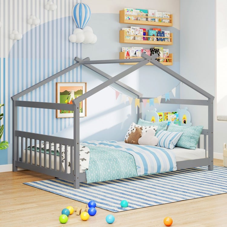 House-shaped Montessori floor bed in gray with supportive headboard, perfect for children's creativity and imagination.