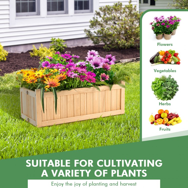 Folding wooden raised garden bed with removable bottom, perfect for growing flowers, herbs, and fruits in your garden.