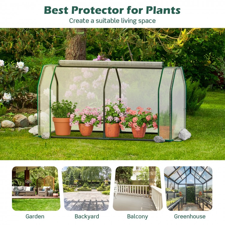 Mini greenhouse with roll-up zipper door, PE cover for weather resistance, ideal for garden or backyard use.