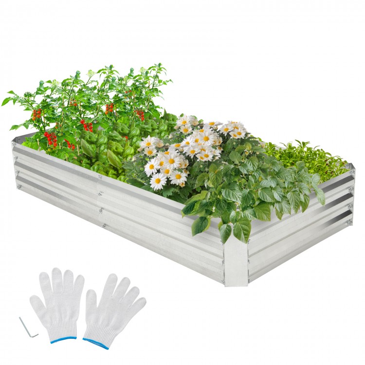 Metal galvanized raised garden bed measuring 6 x 3 ft, filled with various plants and flowers, ideal for outdoor.