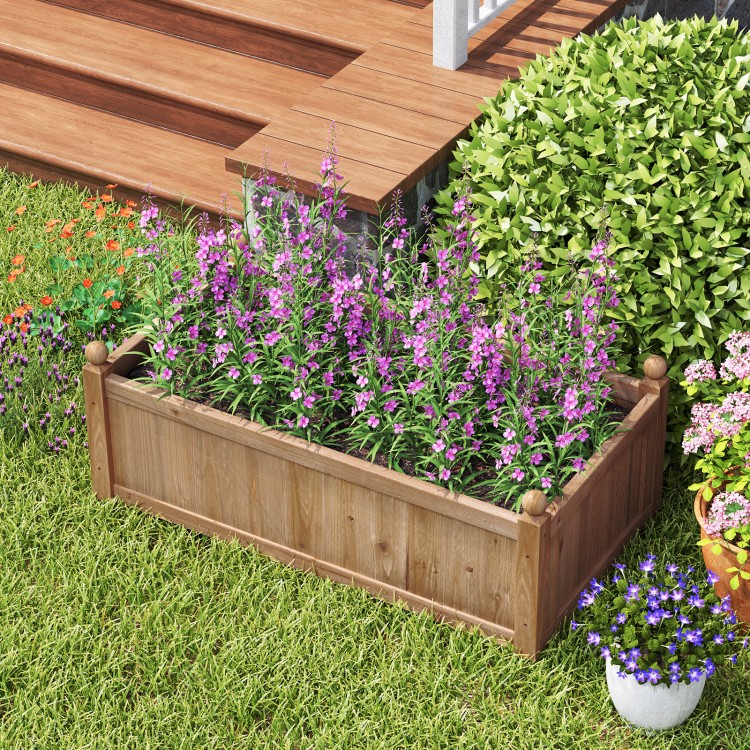 Rectangular brown planter box made of natural fir wood, featuring drainage holes, ideal for backyard garden plants.
