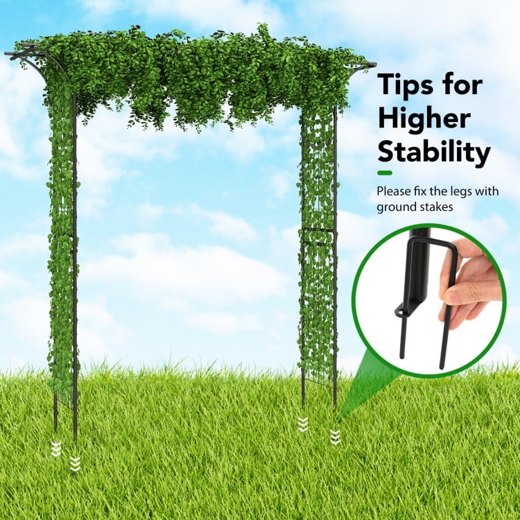 Metal garden arch with green foliage, 81 x 20 inches, sturdy steel construction for climbing plants and vines.