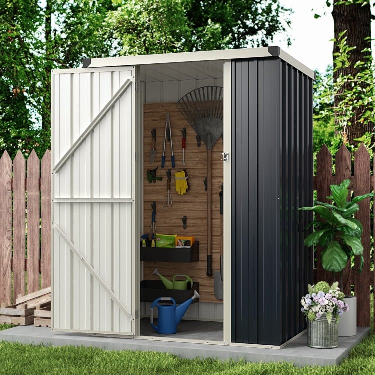 Side view of the 4 x 3 FT gray metal outdoor storage shed, showcasing its spacious interior for yard and tool.