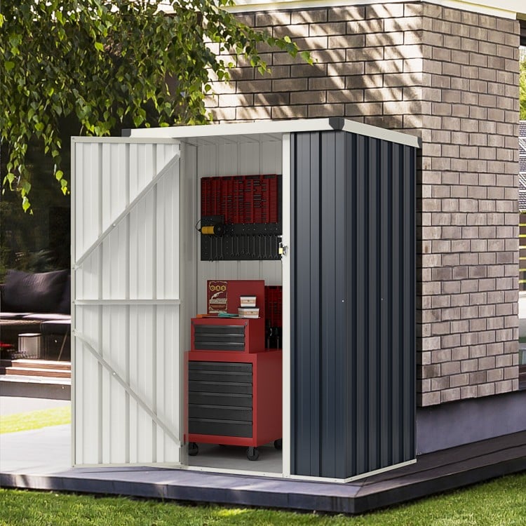 Metal outdoor storage shed with lockable door, gray color, ideal for organizing tools and outdoor items in your yard.