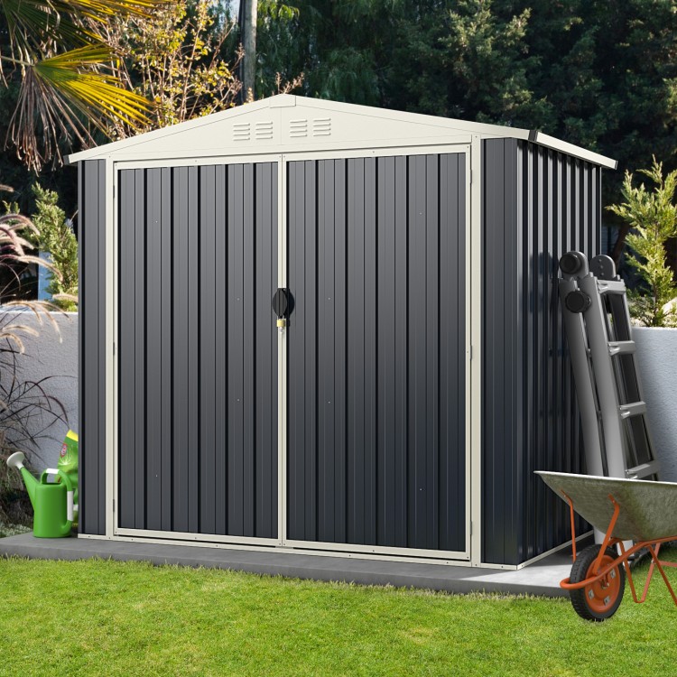 Metal outdoor storage shed with lockable door, gray, 7 x 4 feet, ideal for organizing tools and outdoor items.
