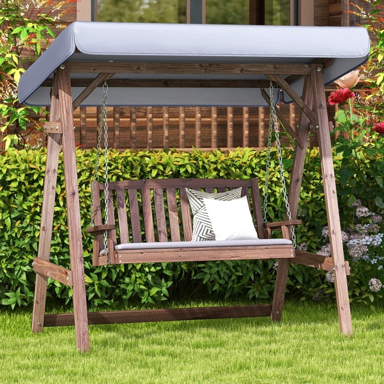 2-person porch swing with fir wood stand, adjustable tilt canopy, and removable cushion for outdoor relaxation.