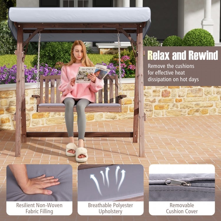 2-person porch swing with fir wood stand and tilt canopy, featuring breathable cushions for outdoor relaxation.