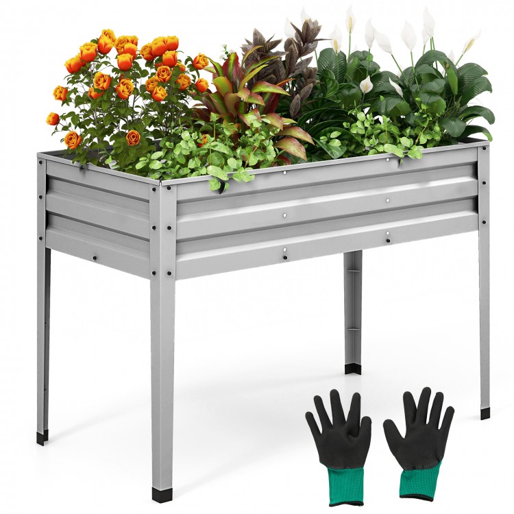Galvanized raised garden bed with legs, featuring vibrant flowers and included gloves for easy assembly and gardening.