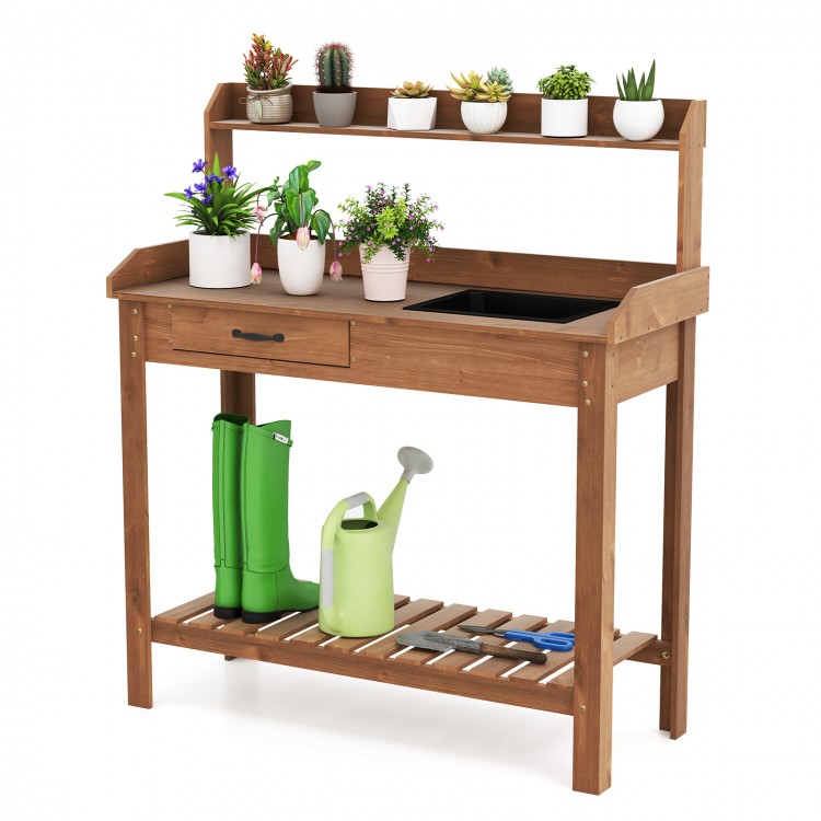 Outdoor wooden garden table work station showcasing the practical sink, perfect for watering and cleaning plants.