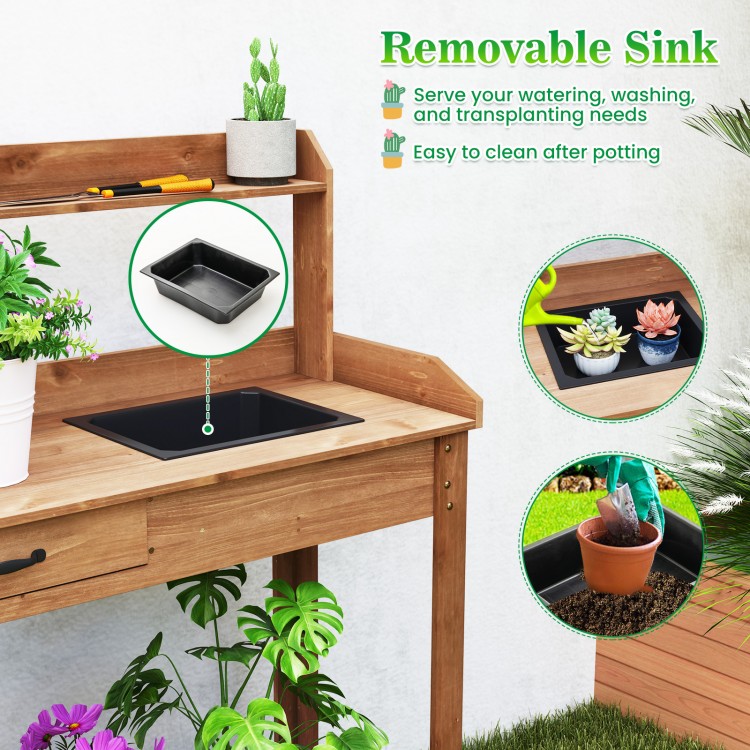 Outdoor wooden garden table work station with removable sink, storage shelves, and drawer for organized gardening tasks.