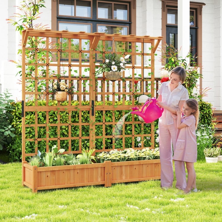 Large wooden planter container with trellis and hanging roof, ideal for climbing plants and flowers in outdoor gardens.