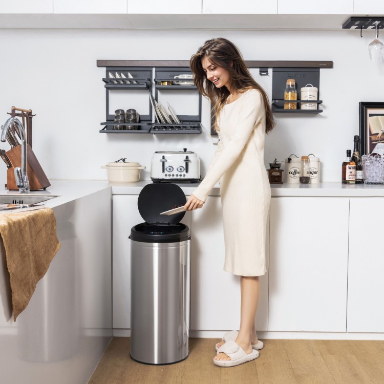 Stainless steel 8-gal automatic trash can with touchless lid and soft close design, ideal for kitchen waste disposal.