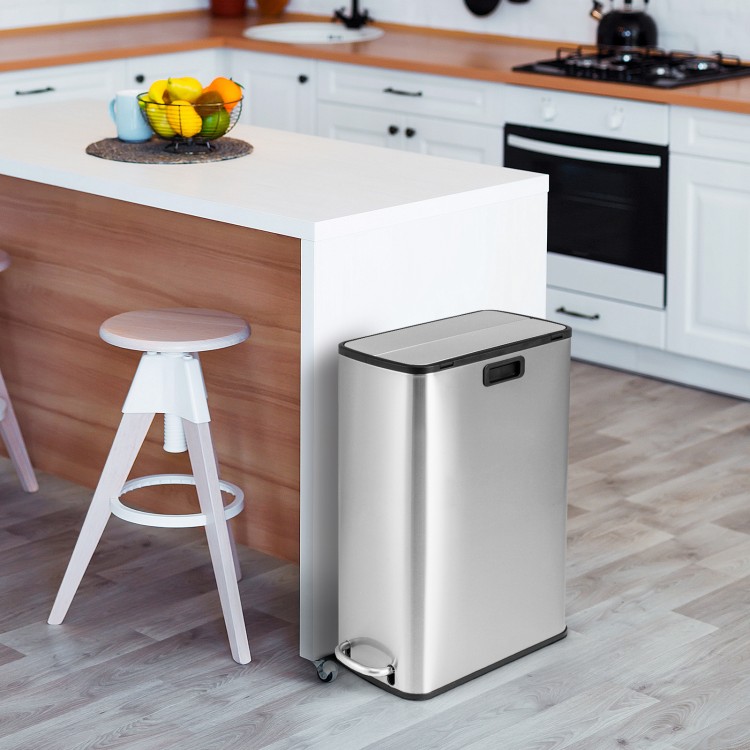 Stainless steel 12-gal trash can with soft-closing wing lids, ideal for kitchens and offices, featuring a space-saving.