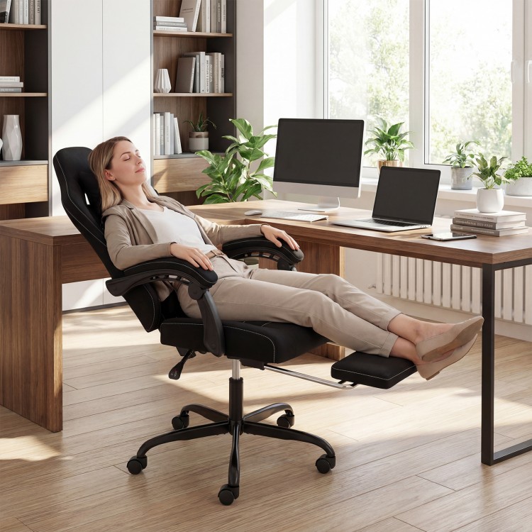 Height adjustable gaming chair with headrest and retractable footrest, designed for comfort during work and relaxation.