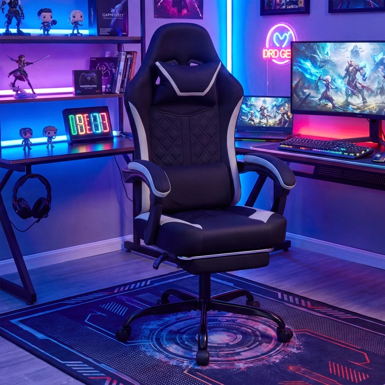 Height adjustable gaming chair in black with ergonomic design, headrest, footrest, and 360° swivel for comfort.