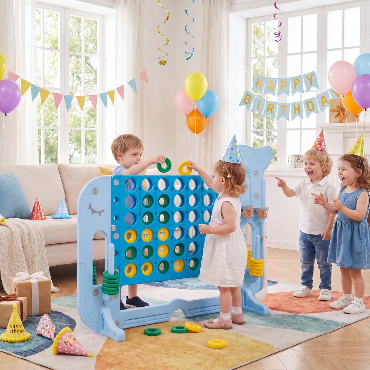Children playing with the Giant 4-to-Score Game Set in blue, featuring a whale design and colorful tossing rings.
