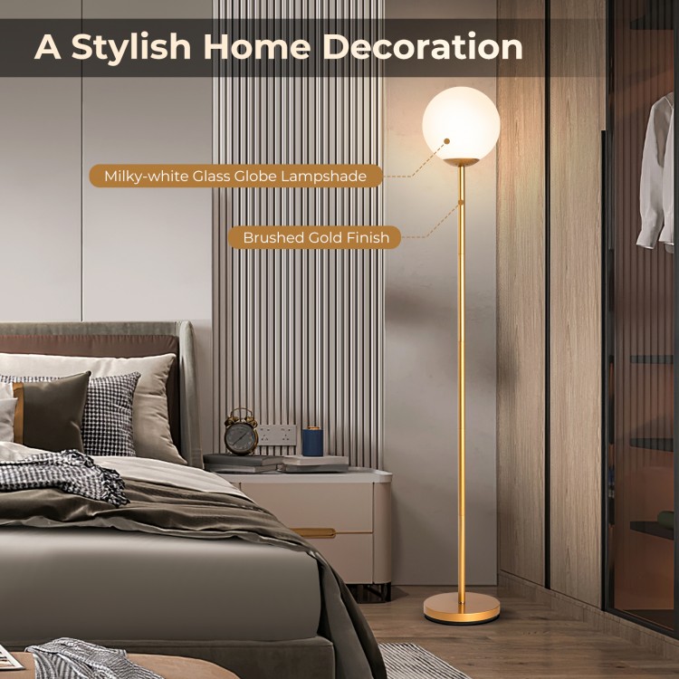 Glass globe floor lamp with brushed gold finish and milky-white lampshade, ideal for stylish home or office decor.