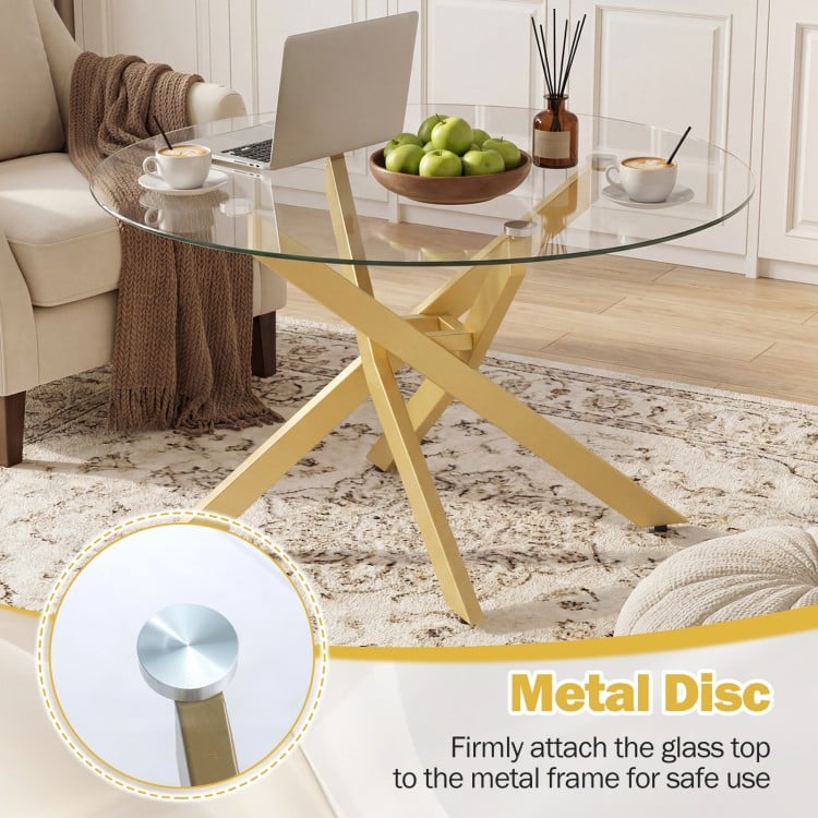 Round glass coffee table with a tempered glass top and geometric gold metal frame, perfect for modern living spaces.
