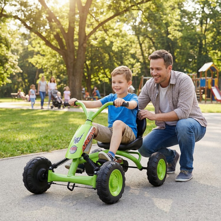Kids' green go-kart with adjustable seat and steering handlebars, designed for outdoor fun and safety.
