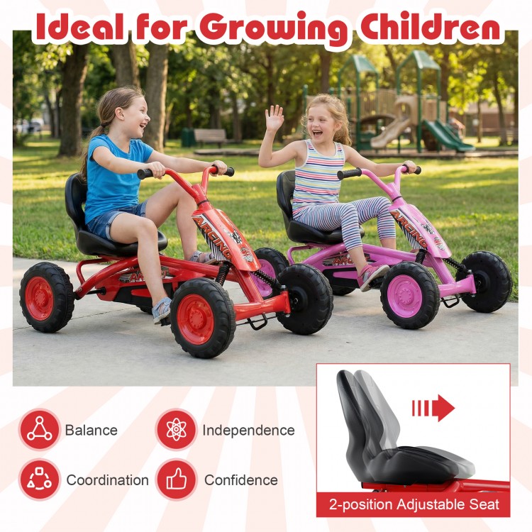 Two kids riding red and pink go karts with adjustable seats, promoting balance and coordination for outdoor fun.