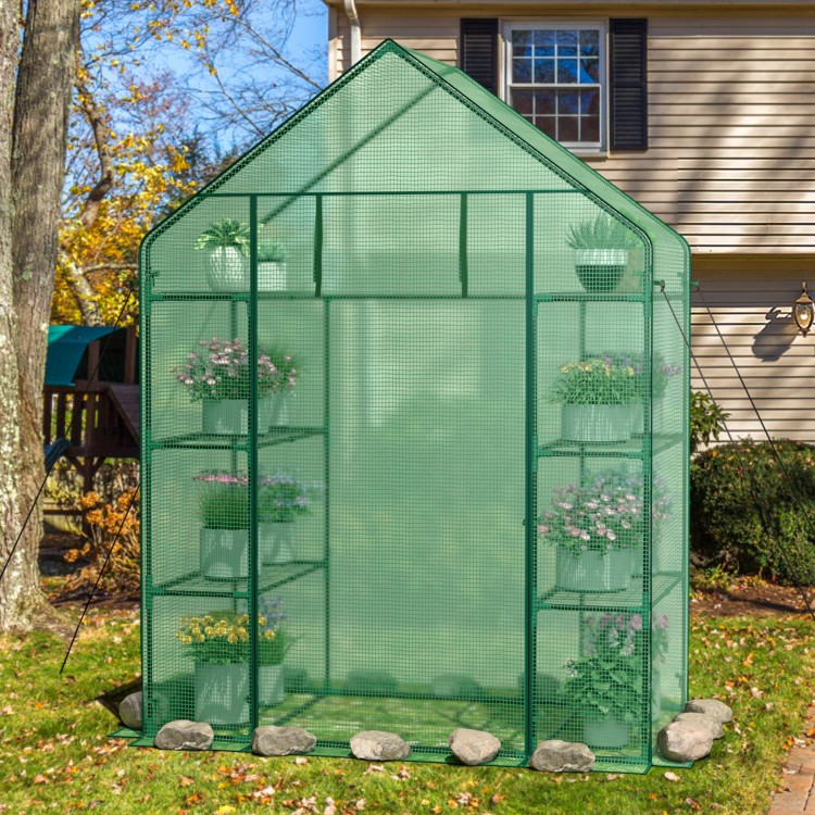 Mini portable walk-in greenhouse with 4 tiers and 8 shelves, designed for optimal plant growth and sunlight exposure.