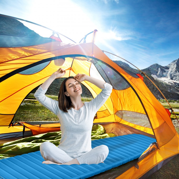 Blue 3-inch thick inflatable camping sleeping pad inside a tent, providing comfort for outdoor adventures.