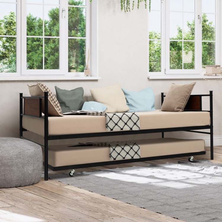 Twin size daybed frame with pullout trundle, featuring a sturdy steel design and cozy cushions for versatile use.
