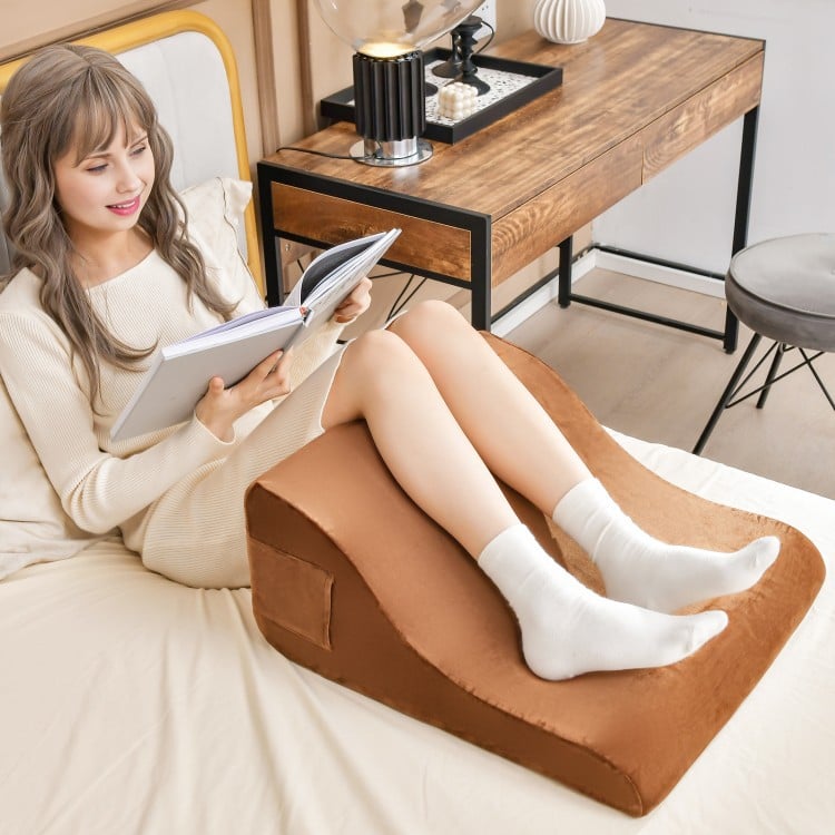 Bed wedge pillow in brown with tablet stand, side pockets, and smooth zipper for versatile support and comfort.