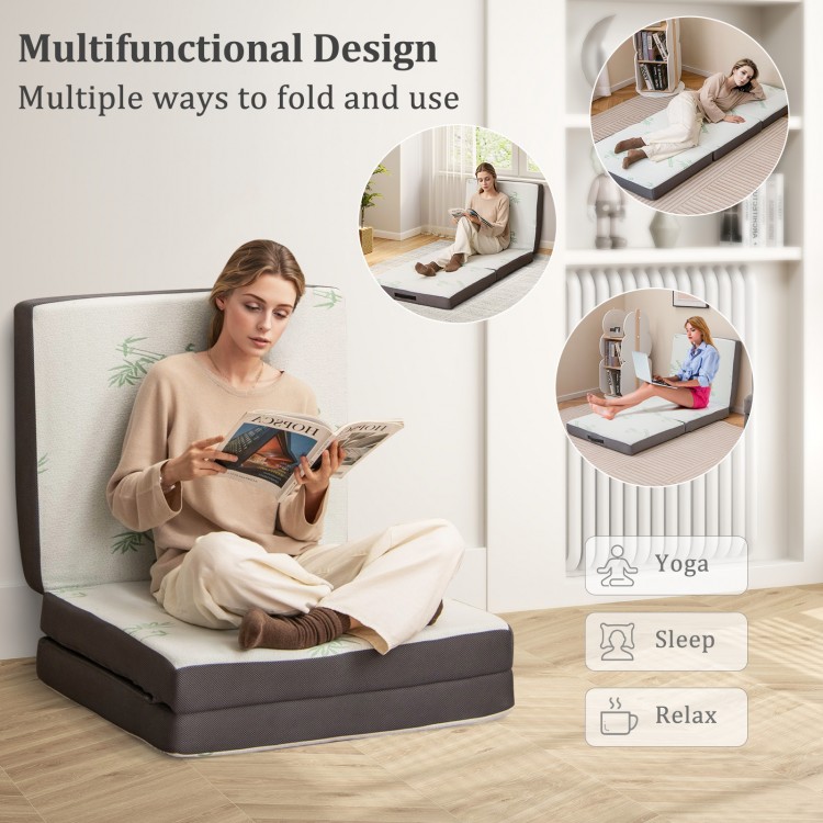 Tri-fold foam mattress in gray with washable cover, ideal for yoga, sleep, and relaxation, shown in a cozy setting.