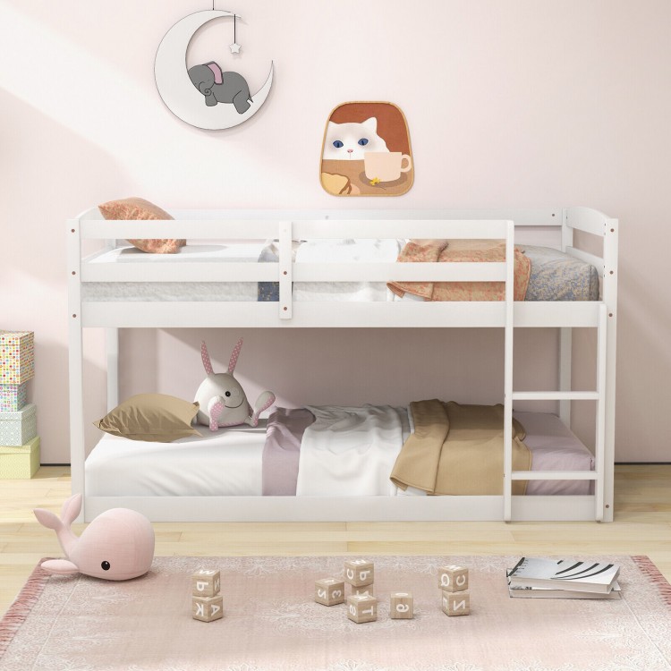 Twin size white bunk bed with high guardrails and integrated ladder, perfect for kids' rooms and space-saving solutions.
