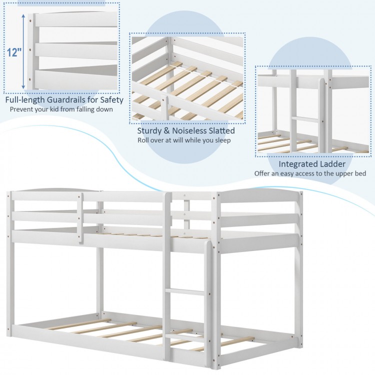 Twin size bunk bed in white with high guardrails and integrated ladder, designed for kids' rooms and space-saving.