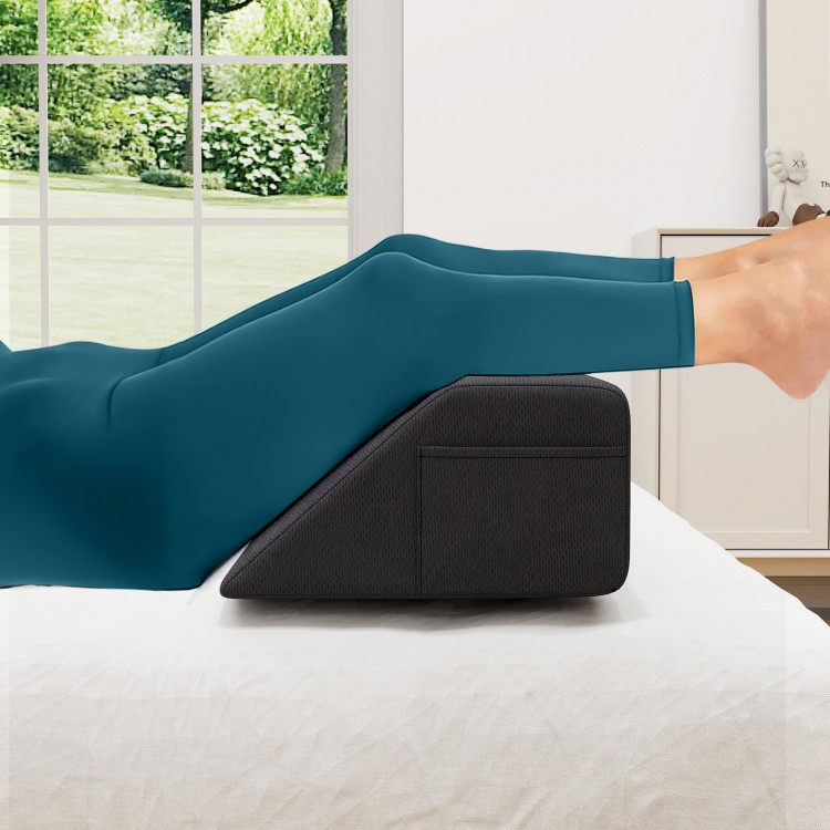 Bed wedge pillow with storage pockets, providing spinal support and comfort for reading or sleeping on a bed or sofa.