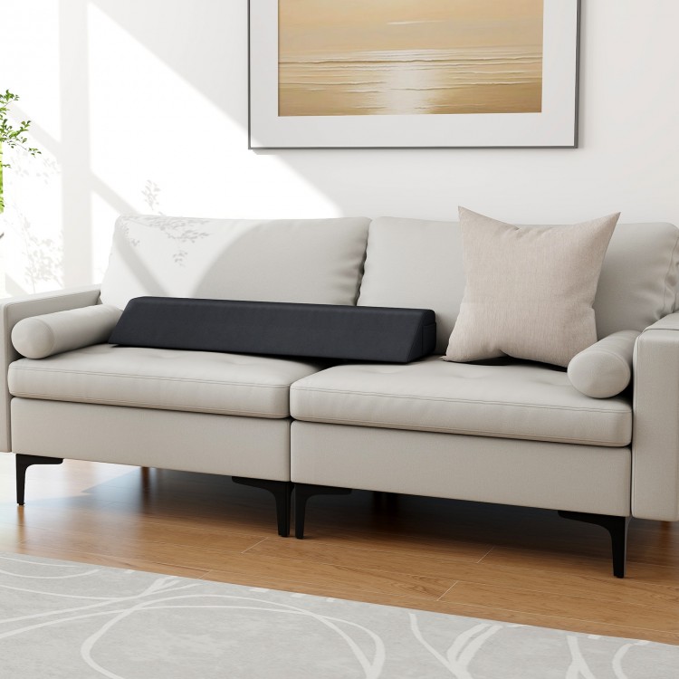 Trapezoidal bed wedge pillow in a light color, designed to fill gaps and support spinal alignment on sofas or beds.