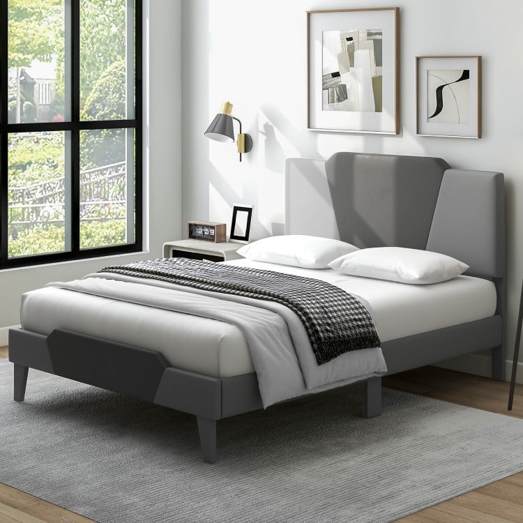 Full-size velvet upholstered bed frame with high headboard, featuring a modern design and strong support slats.