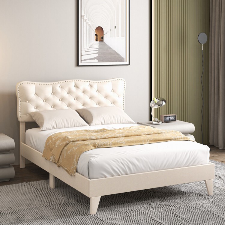 Full size bed frame with nail headboard, button tufted design, and wooden slats for enhanced stability and elegance.