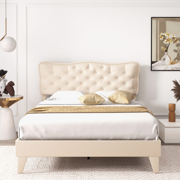 Full size bed frame with elegant nail headboard, button tufting, and wooden slats for enhanced stability and support.